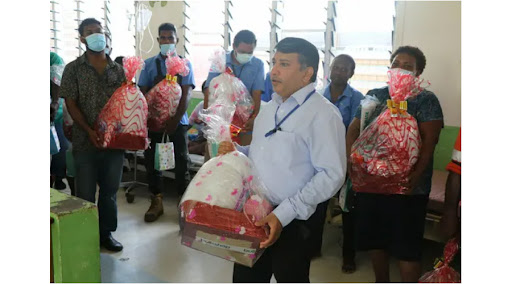 SIPA staff give presents to sick children at the NRH and victims of domestic violence in the care of a Christian Care Centre